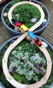 Diy Outdoor Train Table A Wooden Train Garden Railway Garden Railway Wooden Train Gardening For Kids