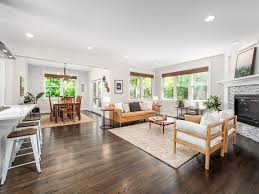 This Old North Durham Dacian delight was custom crafted by Gail Crabtree in  2017. The home boasts 4 bedrooms and an open-concept main floor. The modern  kitchen, cozy living room with fireplace