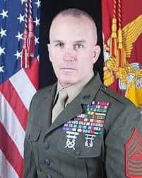 Yesterday, Sgt. Maj. Bradley Kasal, the Marine legend behind one of the  most iconic images of the Iraq War, retired after 34 years of service to  the Corps. Fair winds and following