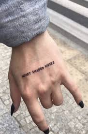 Heart Shaped Kisses Quote Tattoo On The Hand Www Otziapp Com Writing Tattoos Word Tattoos On Hand Tattoos