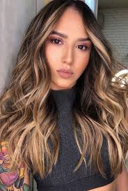 Coloring your hair is one of the best ways to update your look or give yourself a total makeover with maximum impact, so to ensure that you end up with a hair color that looks great, and stays looking great in between color jobs, then give these before and after hair color tips a try. Best Hair Colours To Look Younger Dark Hair With Inverse Blonde
