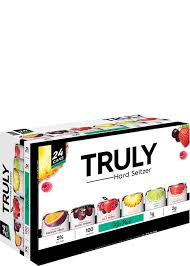 Closeup of lady using tape to close moving box. Truly Hard Seltzer Variety Pack Total Wine More