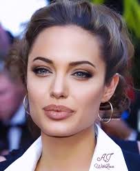 The recipient of numerous accolades, including an academy award and. Angelina Jolie Smile Celebrity Photos Angelina Jolie Burgundy Make Up