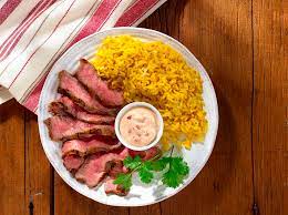 Chipotle Spiced Steak With Garlic Yellow Rice Recipes Goya Foods Full Meal Recipes Yellow Rice Recipes Goya Recipe