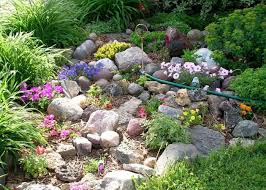 The sides of the home are usually simple but making use of the stones to form a stone yard can be a good idea. 50 Diy Stone Flower Beds And Rock Gardens That Will Boost Your Garden My Desired Home