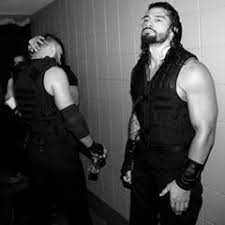 image may contain 1 person standing and beard wwe roman reigns roman reigns family roman reigns