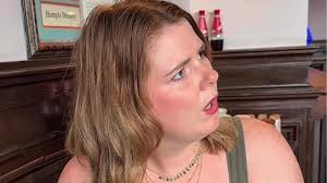 Hilarious video shows drunk woman fall in bush before knocking