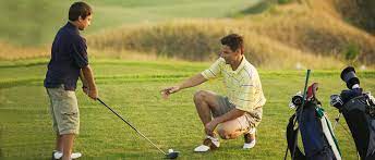 Father Teaches Son How To Play Golf Golf Tips Play Golf Golf Dad