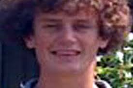 Hundreds gather for young footballer's funeral