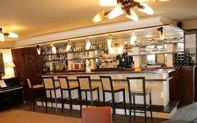 L Hotel Restaurant Le Faisan Dore A Fontenay Sur Orne Dispose De D Un Salon Et D Un Bar Tres Cosy De Style Art Salle Reception Style Art Deco Hotel Restaurant