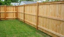 Wood fence on a hill. Fence Company Fence Companies In Spring Hill Fl
