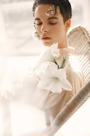 Emotional Portrait of a Guy with Flowers