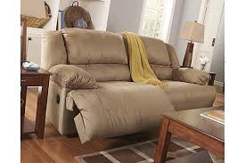 The Hogan Reclining Sofa From Ashley Furniture Homestore Afhs Com The Plush Comfort And Styli With Images Ashley Furniture Sofas Leather Sofa Living Room Reclining Sofa