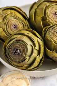 Learn how to select, prepare, and cook these vegetables that are actually the bud of a thistle plant. How To Cook Eat Artichokes 6 Different Ways Spend With Pennies