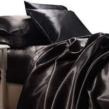 Slip Into Luxury With This Beautiful Black Satin Sheet Set From Ivory Amp Deene Included Is A Fitted Sheet Flat She Silk Bedding Satin Bedding Satin Sheets