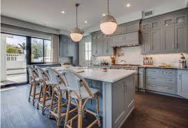 These examples use gray kitchen paint in beautiful ways. 13 Of The Most Beautiful Grey Kitchens We Ve Ever Seen Farmhouse Kitchen Design Grey Blue Kitchen Blue Gray Kitchen Cabinets