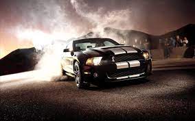 Ford Mustang Shelby Gt500 In A Puff Of Smoke Mustang Wallpaper Mustang Shelby Ford Mustang Wallpaper