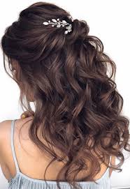Whisper, not shout is the undertone of their aesthetic, and their choice of wedding hairstyles, half up or otherwise, showcase this to a t. Half Up Half Down Wedding Hairstyles Roses Rings