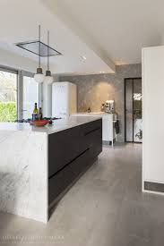 maatwerk keuken keukenontwerp in staal marmer en hout ontwerp carruet interieur be foto liesbet goetschalckx interieur ontwerpen zwarte keukens interieur