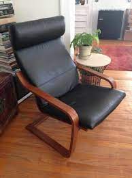 My poang is approaching 10 years of age. Ikea Poang Chair Black Leather Cushion And Medium Brown Frame 100 Mission District Ikea Poang Chair Apartment Inspiration Apartment Decor