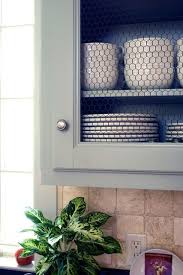 Chicken wire is a versatile material that perfectly complements the farmhouse style. Kitchen Cabinet Detail Chicken Wire Cabinets Beadboard Kitchen Cabinets Beadboard Kitchen