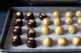 Easy sparkling buckeye truffles made with nilla wafer cookies, powdered sugar, butter, and peanut (or sunflower) butter, then dipped in melted chocolate and sprinkled with. Buckeyes Smitten Kitchen