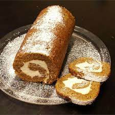 The resulting pumpkin roll slices will impress your guests. Pumpkin Walnut Swiss Roll Recipe All Recipes Uk Pumpkin Roll Chocolate Chip Recipes Thanksgiving Desserts
