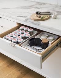 My drawer is 13 inches wide, and it holds 35 spices. The Organized Spice Drawer 8 Rules For Decanting Kitchen Spices The Organized Home