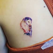 Shoulder Blade Tattoo Of An Owl On A Watercolor Style