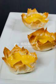 The egg tart is a kind of custard tart found in cantonese cuisine derived from the english custard tart and portuguese pastel de nata. Traditional Chinese Egg Tarts Gene I Always Get Them At The Buffet And Have Been Wanting To Make Our Own Finall Chinese Egg Tart Egg Tart Recipe Egg Tart