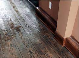 Stenciling is best suited for mimicking the look of ceramic tile or brickwork. Stamped Concrete Can Simulate Real Hardwood Floors Concrete Craft