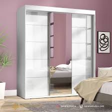 Model lemari pakaian minimalis modern dengan ukuran lemari 3 pintu p 160 cm x l 60 cm x t 210 cm terbuat dari bahan baku dan bahan penolong terbaik yang dikerjakan langsung oleh pengrajin mebel duco jepara yang sangat berpengalaman dalam membuat berbagai macam model lemari minimalis. Lemari Pakaian Sliding 3 Pintu Kaca Sarana Mulya
