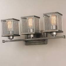 The Graphite Finish And Combination Glass And Wire Cage Give This Lighting Collection A True Urban Style 8 Vanity Lighting Vanity Light Bar Bathroom Lighting