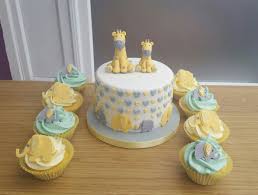 Elephant baby shower sweet table an adorable pink and white desserts table. Giraffe And Elephants Baby Shower Cake And Cupcakes Baby Shower Giraffe Elephant Baby Shower Cake Baby Shower Cakes