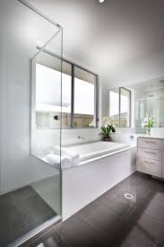 Bathroom bright airy bathroom design with glass partition decorated with small window. 101 Custom Primary Bedroom Design Ideas Photos Bathroom Interior Design Bright Bathroom Bathroom Interior