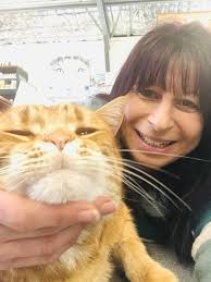 Is he smiling or pleased with himself?