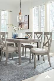 Parellen Dining Room Set With Upholstered Chairs And Table By Ashley Furniture Industries Inc Bring A Comfortable Dining Chairs Gray White Decor White Decor