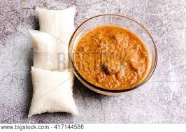 We like our kuah kacang with lots of peanuts and not too spicy. Picture Nasi Impit Image Photo Free Trial Bigstock