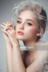 Beautiful Woman With Make Up And Stylish Hairstyle Stylish Hair Most Beautiful Faces Pale Beauty