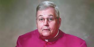 Reverend Monsignor Harry K. Snow, 70, of Ogdensburg