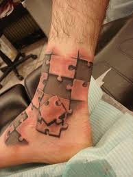 All the different colors and shapes are often used to represent the diversity of all the kids and grownups living with autism. 20 Puzzle Ideas Autism Tattoos Puzzle Tattoos Puzzle Piece Tattoo
