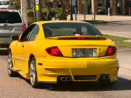 Image result for Yellow 2004 Pontiac