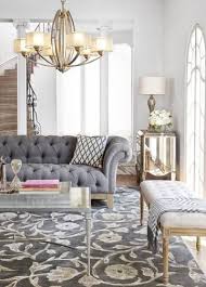 Gri chester koltuk takimi icin 10 ilham veren fikir dekordiyon mobilya yatak odasi tasarimlari koltuklar. Gray Toned Furniture And Floor Coverings Keep The Color Palette Calm While A Graceful Chandelier Brings I Luks Oturma Odalari Oturma Odasi Tasarimlari Ev Icin