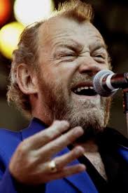 John Robert "Joe" Cocker, OBE is an English rock and blues singer, who came  to popularity in the 1960s. He is most known for his gritty voice and  idiosyncratic arm movements while