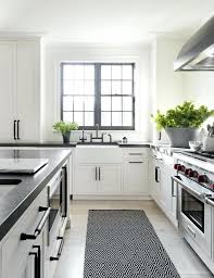 White shaker cabinetry with black countertops and glass by south shore decorating. Black Hardware Farmhouse Kitchen White Shaker Cabinets Decoomo