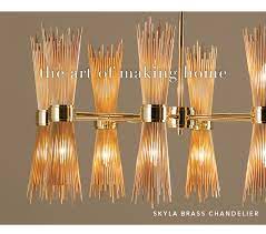 Sciolari chandelier with brass frame surrounded by crystal glass pieces. Ethan Allen See It First All New Look Uptown Milled
