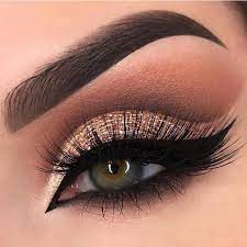 Fierce Glitter And Cat Eye Get All Your Makeup Essentials From The Makeup Club Dramatic Eye Makeup Blue Eye Makeup Golden Eye Makeup