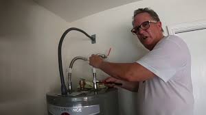 Water heaters provide hot water for homes and other buildings. Replace Electric Hot Water Heater Rheem Youtube