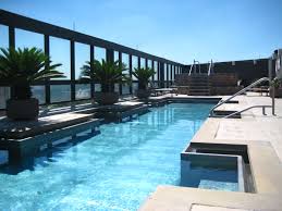 The swimming pool on the roof is definitely a good idea when you lack space, but not only. Cool Rooftop Pool And Bar In Austin Swimming Pool Designs Rooftop Pool Rooftop Design