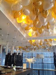 Birthday Decoration At Home With Balloons And Lights White With A Hint Of Gold Balloon Ceiling Balloons Balloon Decorations